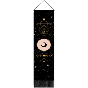 Detailed view of bohemian black moon phase tapestry with golden celestial symbols and tassels