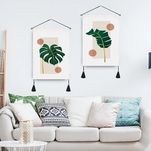 Minimalist Nordic wall hanging tapestries with tropical leaves and black tassels for home