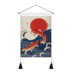 Macro detail of Japanese carp tapestry showing blue waves, red sun, and silk tassels