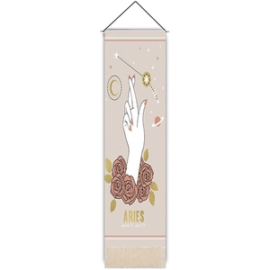 Detailed view of Aries tapestry featuring pink roses and golden astrological symbols