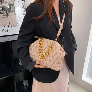 Beige quilted cloud bag with thick gold chain and pleated leather texture for women