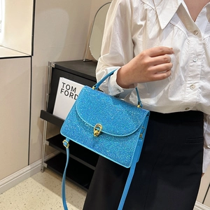 Sky blue sequin crossbody bag for women with golden double ring lock and party style