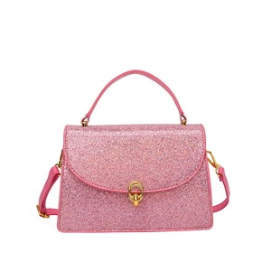 Pink sequin crossbody handbag for women with golden circular ring buckle and handle