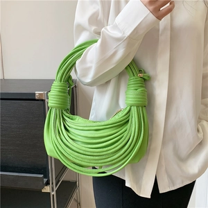 Bright green woven knotted shoulder bag with unique multi-layered rope design for women