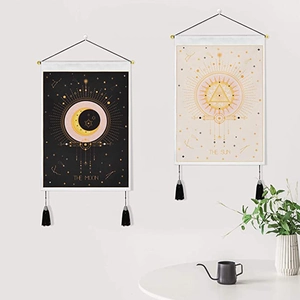Bohemian sun and moon wall tapestries with tassels in a minimalist home setting