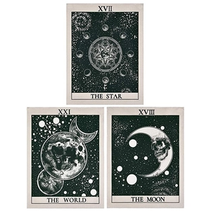 Detailed view of bohemian tarot tapestries with the star world and moon designs