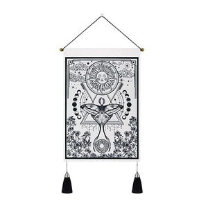 Monochrome moth and moon phase tapestry with sun face and tassel wall decor