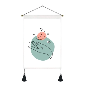 Detail of minimalist wall tapestry with artistic line art, hanging rod, and black tassels