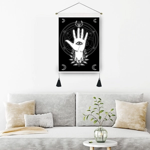 Bohemian sun and moon tapestry wall hanging with eye palm design and black tassels