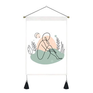 Minimalist wall hanging tapestry with line art portrait and decorative black tassels