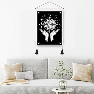 Bohemian mandala wall hanging with hands holding celestial compass and moon details