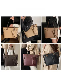 Vue détaillée de grands sacs cabas en cuir en plusieurs couleurs portés par un mannequin