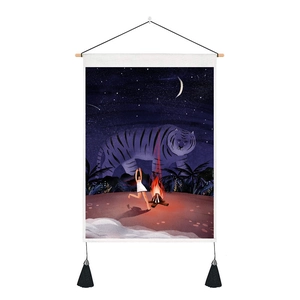 Detail of artistic tiger and girl tapestry featuring campfire scene and black tassels