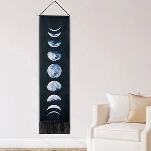 Nordic lunar phase wall tapestry with dark blue background and elegant black fringe