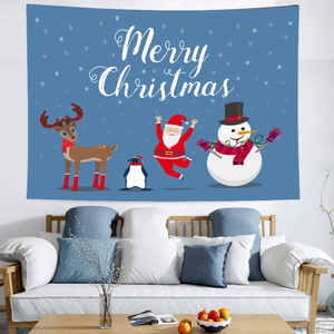 Christmas tapestry featuring Santa Claus and reindeer over a blue wall decoration scene