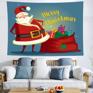Detail of Christmas Santa tapestry wall decor hanging above a minimalist sofa
