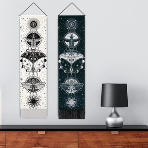Nordic wall hanging set with moth, moon phases, and sun totems on black and white canvas