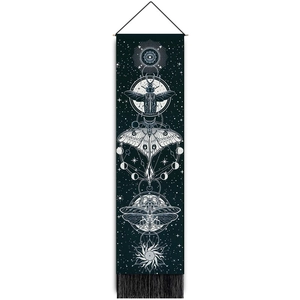 Black tapestry with white moth and moon phases, featuring top wooden bar and bottom fringe
