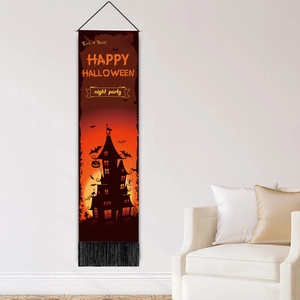 Vertical Halloween wall hanging with castle and pumpkin design with black tassels