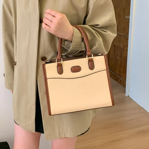 Chic cream and brown contrast tote bag with top handle for professional women