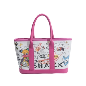 Graffiti canvas tote bag with pink leather trim and artistic street style bear pattern