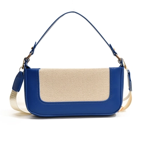 Contrast panel crossbody bag in navy leather and beige fabric with dual straps