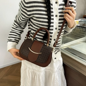 Retro dark brown saddle bag for women with woven texture flap and golden metal buckle