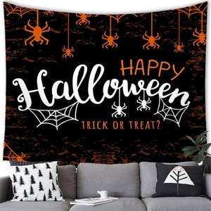 Dettaglio di un arazzo di Halloween con scritte Happy Halloween e motivi di ragno