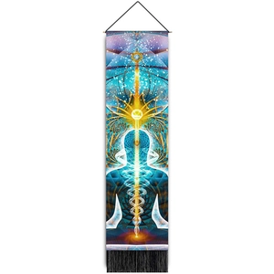 Close-up of meditation tapestry featuring a glowing human silhouette and black fringe detail