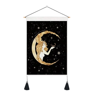 Detail of sun and moon tapestry featuring I AM WILLING TO CHANGE text and tassels