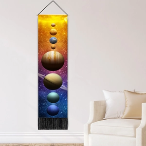 Modern wall hanging decor featuring a solar system planet print with stylish black tassels