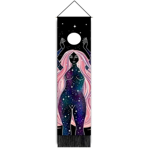 Close-up of celestial goddess wall tapestry with moon and galaxy prints and black fringe