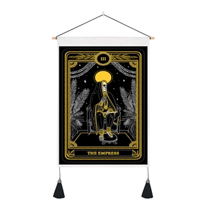 Macro detail of The Empress tarot wall tapestry featuring skull art and black tassels