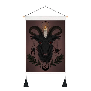 Detail of dark gothic Baphomet wall hanging with spider web and black tassels