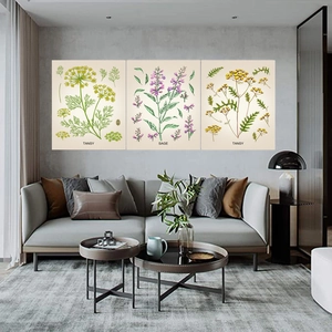Three-piece botanical wall art set featuring tansy and sage illustrations on canvas