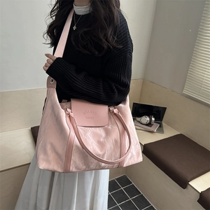 Pink large capacity travel bag with stylish marble texture and wide shoulder strap