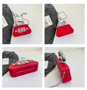 Detailed four-way view of red evening bag with heart handle and crystal patterns