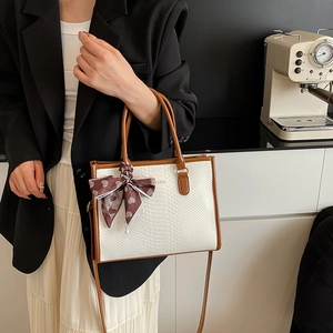 Snake pattern tote bag with scarf detail and adjustable strap for women in office style