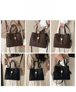 Detailed views of leather bucket bag being worn as handbag, shoulder and crossbody bag