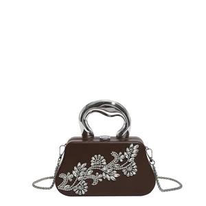 Brown rhinestone evening clutch bag with silver floral pattern and metal handle