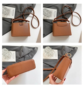 Detail view of a premium caramel leather bucket bag showing front, back, bottom, and sides