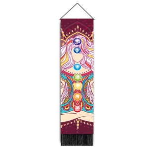 Close-up of meditation tapestry showing seven chakras and elegant black tassels