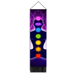 Vertical yoga tapestry detail featuring glowing seven chakras and bottom fringe tassels