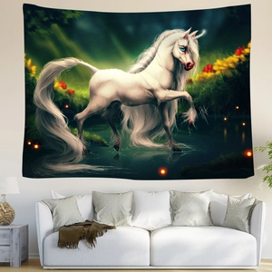 Detail of magical white unicorn tapestry hanging over a sofa in a modern living room