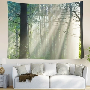 Close-up of Nordic forest wall tapestry with natural sunlight detail over a white sofa