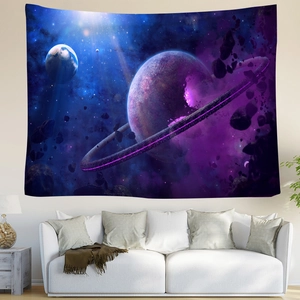 Deep blue and purple psychedelic galaxy planet tapestry hanging over a white sofa