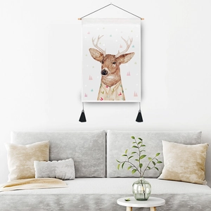 Nordic wall hanging tapestry featuring deer head illustration with wooden pole and tassels