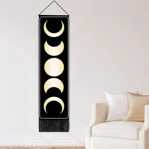 Black and gold moon phase wall tapestry with elegant tassels for home decor hanging