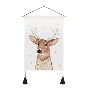 Detail of Nordic wall tapestry featuring artistic elk print and black bottom tassels