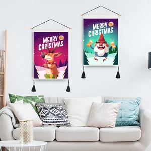 Christmas tapestry wall hanging with reindeer and elf patterns and decorative black tassels